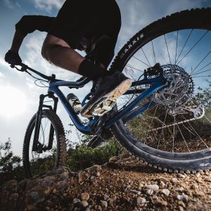 Closeup of biker with flat pedals
