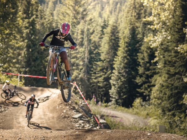 Anita Naidu jumping on Whistler Bike Park's A-Line trail
