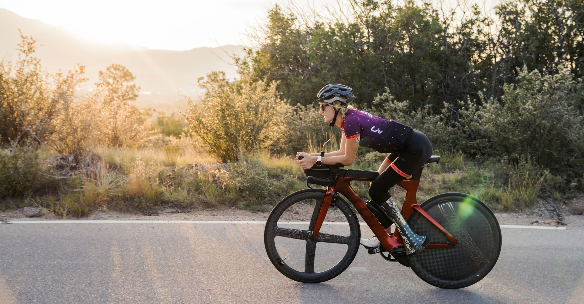 Allysa Seely riding the Avow triathlon bike late in the evening