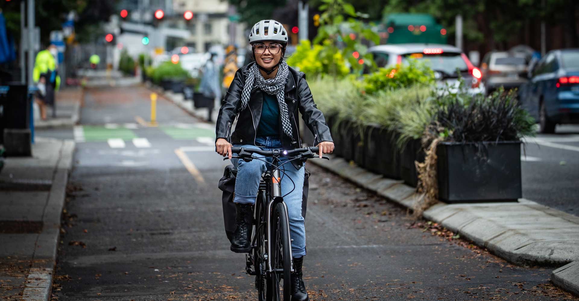 woman riding a bike in the city