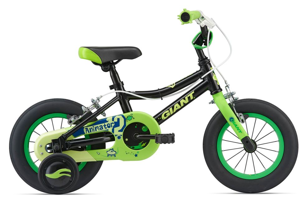 green bike with training wheels