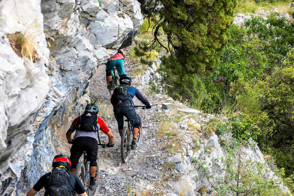 Mountain bikers riding in a gorge