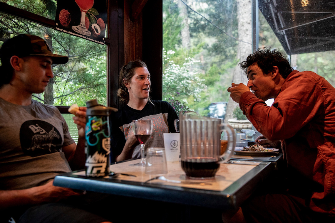 Mountain bike riders refuelling between rides